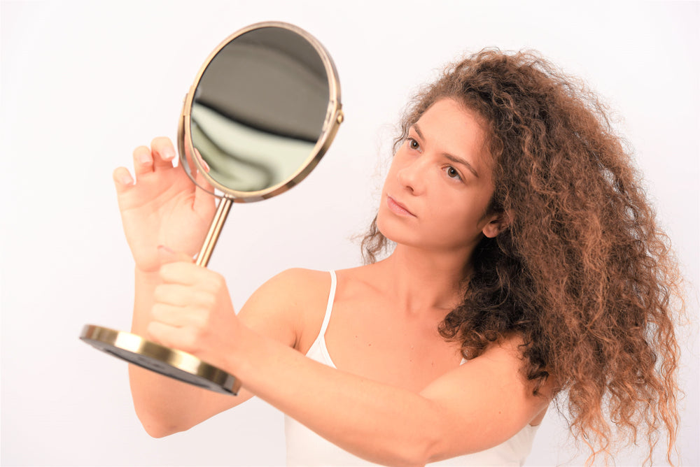 Dry, Brittle Curls? Start With One Weekly Habit