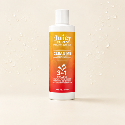 Juicy Curls Clean Me sulfate-free cleansing conditioner bottle on a soft studio background